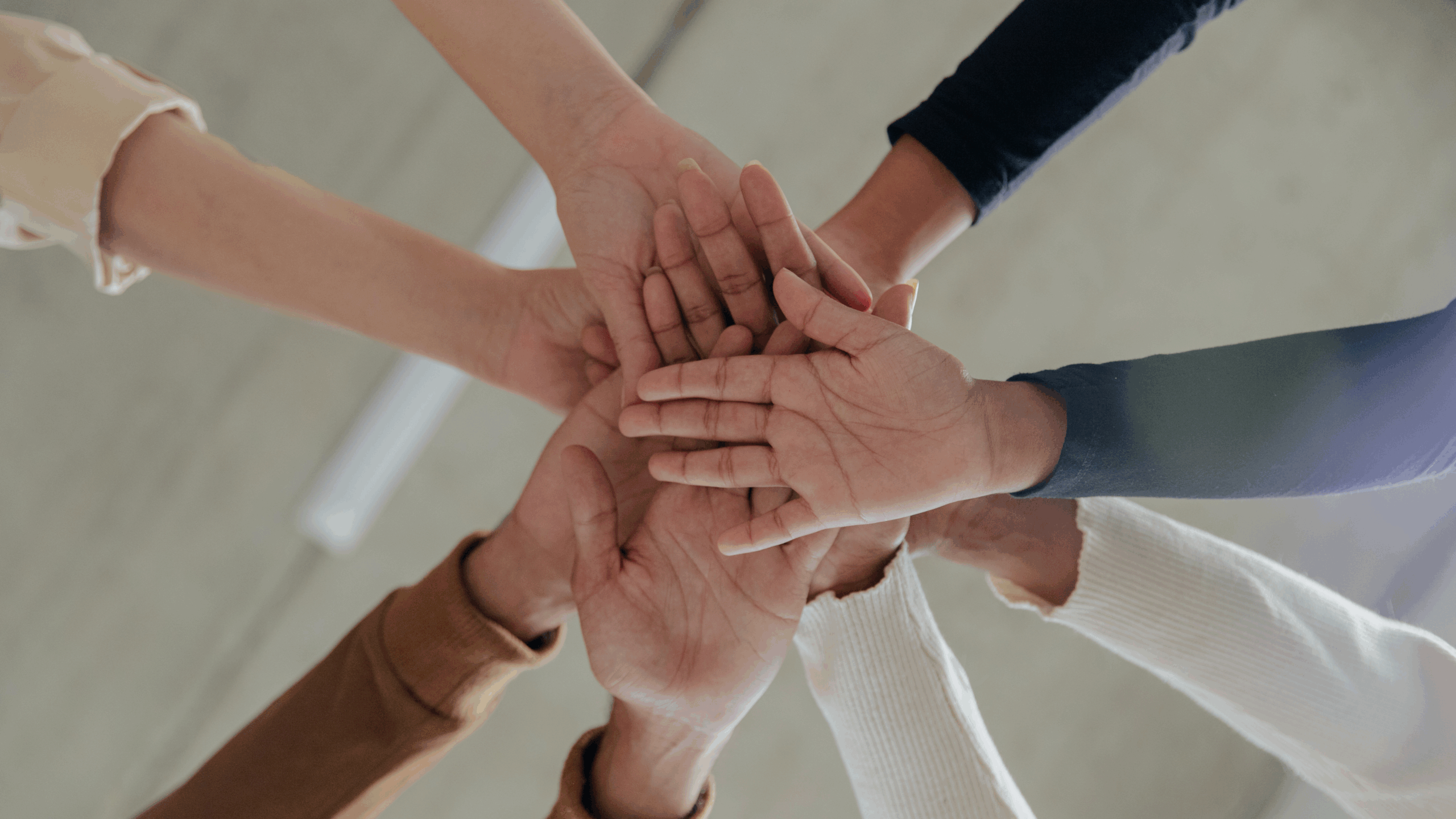 Educators and technicians working together to manage classroom devices, symbolizing Techcycle Solutions’ commitment to helping Kansas and Missouri schools through local, hands-on technology support.